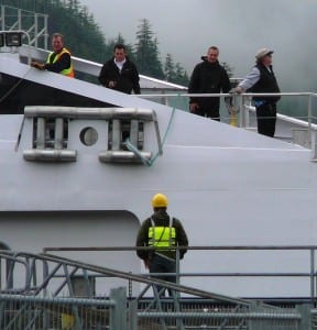 Fairweather crew members and shore staff get ready to tie up the fast ferry at Sitka's terminal. It and three other ships are slated to be tied up next year. (Ed Schoenfeld/CoastAlaska News)