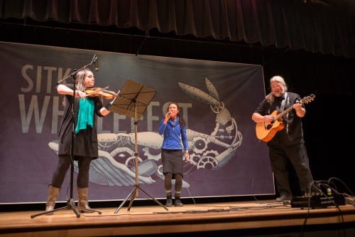 From left, Kammie Daniels, Cara Brenton and Ted Howard perform Otis Redding's (Sittin' On) The Dock of the Bay. (photo by Mike Hicks)