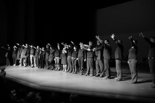 The x member cast extends a thank you to lighting and sound crew as they take their bows. (Mike Hicks/KCAW photo)