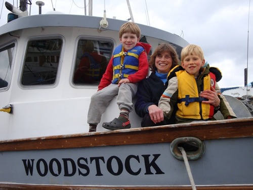 Linda Behnken with her sons, Halen and Rio. Behnken lives the small-boat fishing life she advocates for, but she's no stranger to IPHC politics. She's chaired the 84-member IPHC Conference Board for the last several years. (ALFA photo)
