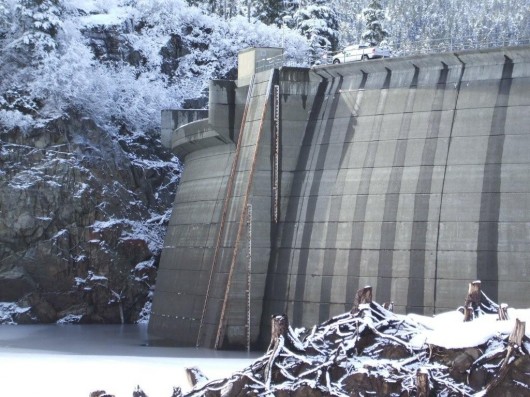 The Green Lake Dam, as seen in a 2008 file photo. As water levels begin to drop, the city has renewed its call for Sitkans to conserve electricity. (File photo)