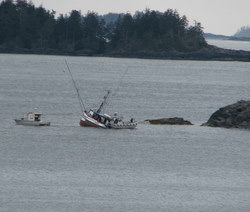 Troller “Igloo” aground near runway, crew safe