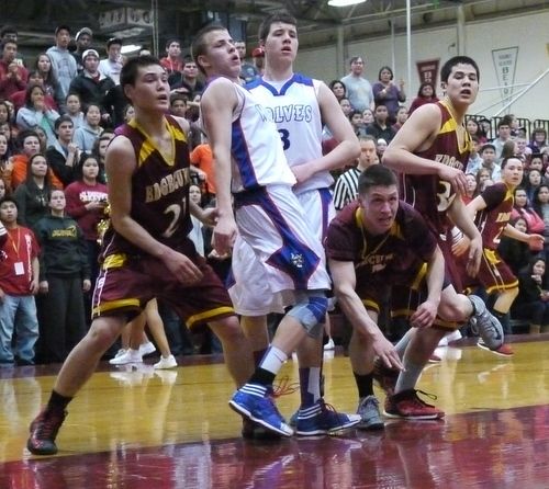 The Mt. Edgecumbe Braves and Sitka Wolves in 2nd Round action Wednesday. (KCAW Photo/Robert Woolsey)