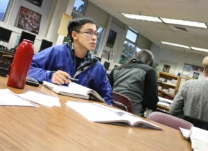 Mt. Edgecumbe High School senior Nelson Kanuk works in trigonometry class on Thursday, Dec. 6, 2012. Kanuk is one of six Alaska youth suing the state, asking it to pay more attention to climate change. (Photo by Ed Ronco/KCAW)