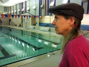 Former pool manager Jane Eidler looks out over the Blatchley Pool in 2013, the last time aquatics was on the district's chopping block (KCAW photo by Ed Ronco)