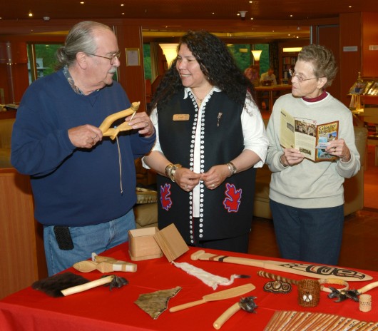 Cultural Heritage Guide Faith Grant discusses Tlingit heritage with cruise ship visitors. Courtesy Alaska Native Voices.
