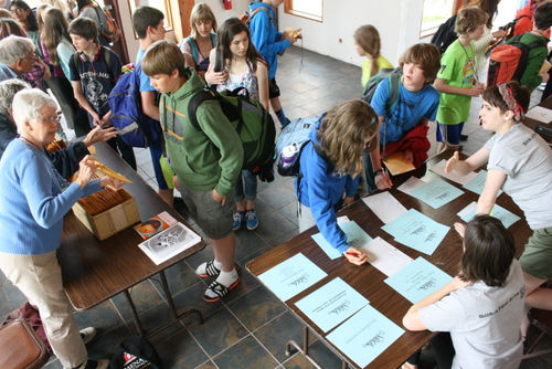 Middle school campers register for sessions inside Allen Memorial Hall at the Sitka Fine Arts Camp in 2012. (KCAW photo by Ed Ronco)