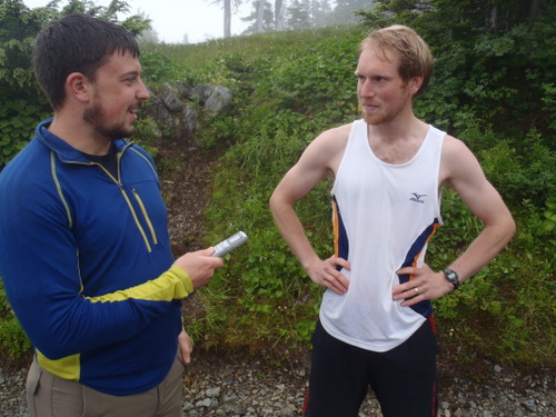 Sentinel sports editor Tom Hesse (l) interviews defending Alpine Adventure Run champion Sam Scotchmer following his record-breaking win.
