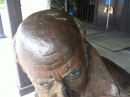 Police say vandals left a total of seven gouges on the Baranov statue's head and one on the bridge of its nose. In this photo, you can see two of the head gouges. (KCAW photo by Ed Ronco)