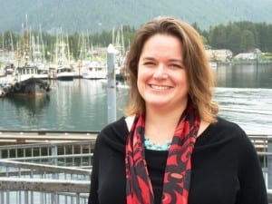 Analyst Meilani Schijvens stands by Sitka's Crescent Harbor and lightering dock. She  told the Southeast Conference fishing and tourism are growing in the region. CoastAlaska News photo)