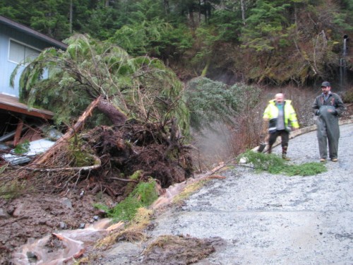 Brian Bickar and Troy Bayne helped reroute a creek in the Cascade Creek neighborhood to mitigate further damage. (KCAW photo/Emily Forman)