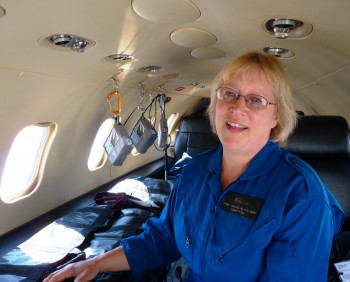 Airlift Northwest's Shelly Deering explains the medical equipment in a medevac Learjet. She urged lawmakers to pass a bill allowing the service's membership program to keep operating in Alaska. (Ed Schoenfeld/CoastAlaska)