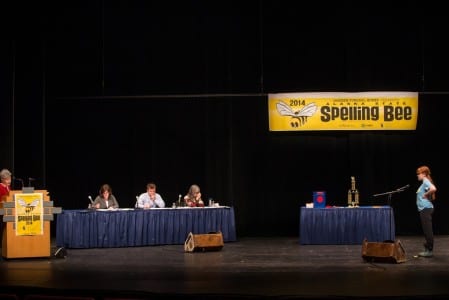 Abigail Fitzgibbon stands alone for her championship word at the state bee. (Paul Fitzgibbon photo)