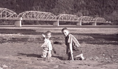 Dennis Girardot (left) with his brother John Reitz (right) at the Knik River bridge in Palmer. Girardot was five year old when he and his family survived the Great Alaska Earthquake of 1964. (Photo courtesy of Dennis Girardot).