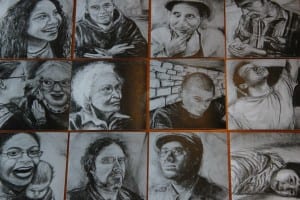 MacNaughton created a set of portrait trading cards from her work. (KCAW photo/Rachel Waldholz)