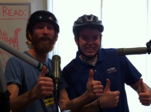 Ryan Kauffman and Patrick Williams encourage bike safety. (KCAW photo).