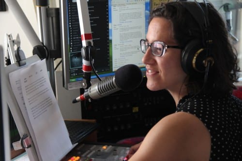 Emily Forman delivers her last newscast. (KCAW photo/Rachel Waldholz)
