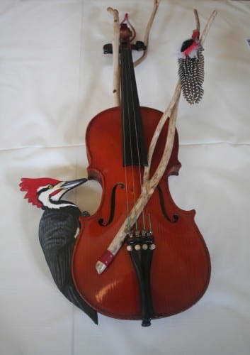 "Fiddle and Drum," a donated violin decorated by Laura Kaltenstein. Photo by Greta Mart.
