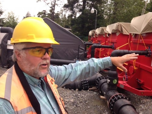 Sitka environmental superintendent Mark Buggins looks over the temporary filtration  plant at the Indian River. Buggins says August is "not the best time" to drink from the Indian River, but "it is what it is." (KCAW photo/Robert Woolsey)