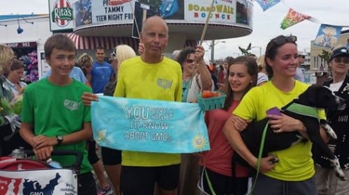 David Wilcox (l.), Brett Wilcox, Olivia Wilcox, and Kris Wilcox are greeted on the boardwalk in Ocean City, NJ, as they wrap up their 6-month, 3,000 mile run. (RunningTheCountry.com photo)