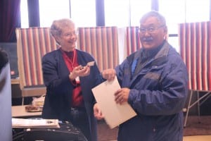 Voting during Sitka's 2014 municipal election. (KCAW photo/Rachel Waldholz)