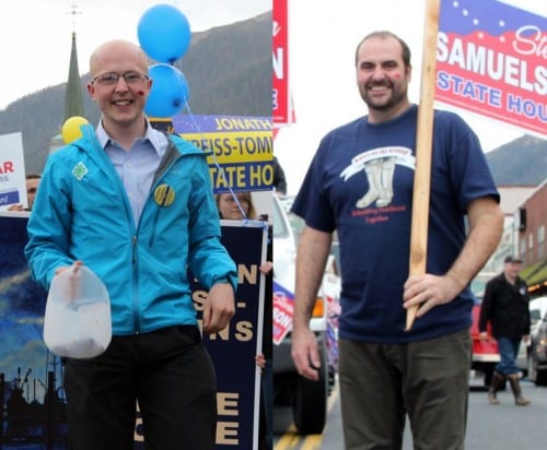 Jonathan Kreiss-Tomkins (L) and Steven Samuelson (R) marching in the 2014 Alaska Day Parade (KCAW photo/Rachel Waldholz)