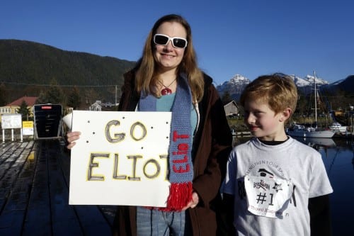 Eliot and his proud mom, who knitted a scarf in support. (Emily Kwong/KCAW photo)