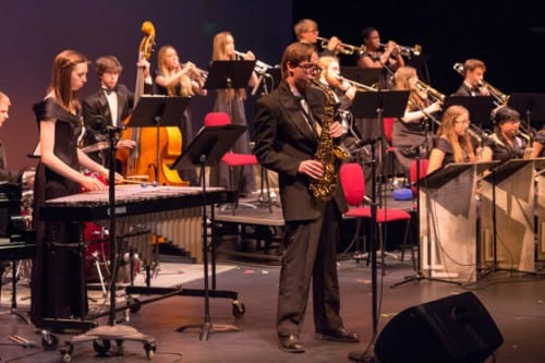 A Blatchley student performs a saxophone solo during the Saturday evening performance. (Mike Hicks/KCAW photo)