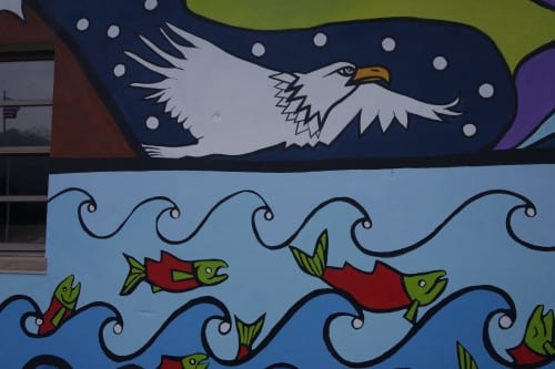 The eagle stands for the Eagle Moeity of the Tlingit Clan and the salmon for Southeast Alaska. (Emily Kwong/KCAW photo)
