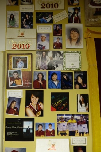 Mt. Edgecumbe opened in 1947 under the BIA. Now run by the state, generations of students have passed through the school. Graduation photos hang on residential principal Andrew Friske's wall. (Emily Kwong/KCAW photo)