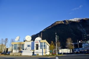 Juneau's KTOO building houses radio, online and TV operations funded in part by the state. Legislative budget cuts will hit public broadcasters throughout the state beginning in July.