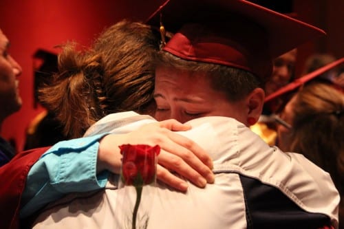 Students graduating from Mt. Edgecumbe High School thanked parents and family members with a rose. (Emily Kwong/KCAW)