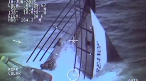 The 80-foot tender Kupreanof slips beneath the waves just seconds after the last crew member was hoisted aboard an Air Station Sitka helicopter. (USCG image)