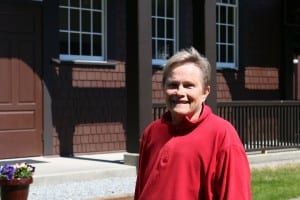 Carol Odess stands in front of Allen Memorial Hall. The theater inside of it will officially be known as the Odess Theater after the Sunday (6-7-2015) dedication ceremony.