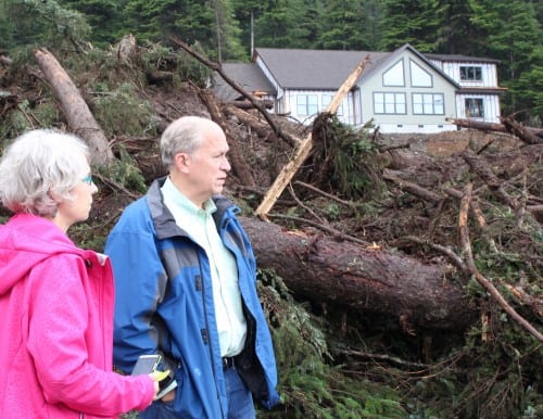 Gov. Bill Walker (right) and Sitka Mayor Mim McConnell visited the site of the Kramer Avenue landslide on Wednesday, August 19. (Rachel Waldholz, KCAW)