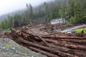 The Kramer Avenue landslide on Tuesday wiped out a house and much of the road. Three people are missing and presumed dead. (Rachel Waldholz, KCAW)
