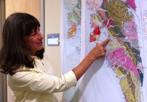 Geologist Susan Karl points to faults shown on a new geologic map of Baranof Island, in Southeast Alaska. It reflects the discovery that the island's bedrock is different from that of other parts of the region. (Ed Schoenfeld/CoastAlaska News)