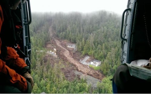 The South Kramer landslide tore through the Benchlands subdivision, claiming the lives of three men and destroying property. (Credit: US Coast Guard)