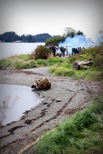 The steaming on Sitka's Eagle Beach attracted friends and family of the carvers along with Park Service employees. (KCAW Photo/Emily Russell)