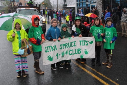 The Sitka Spruce Tips 4-H Club marching in the 2016 Alaska Day parade. (KCAW Photo/Emily Russell)