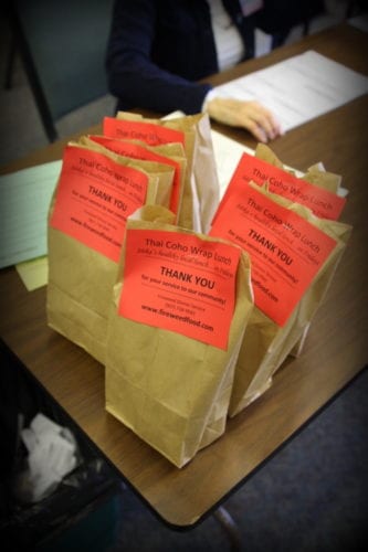 Workers at Grace Harbor got Thai Coho wraps for lunch on election day. (Emily Russell/KCAW Photo)