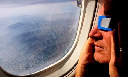Never mind the rain, Sitkans take to the skies to view eclipse