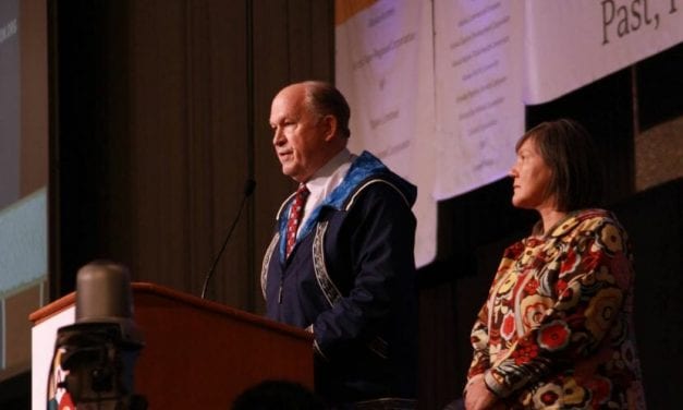 Governor Walker suspends campaign and backs Begich