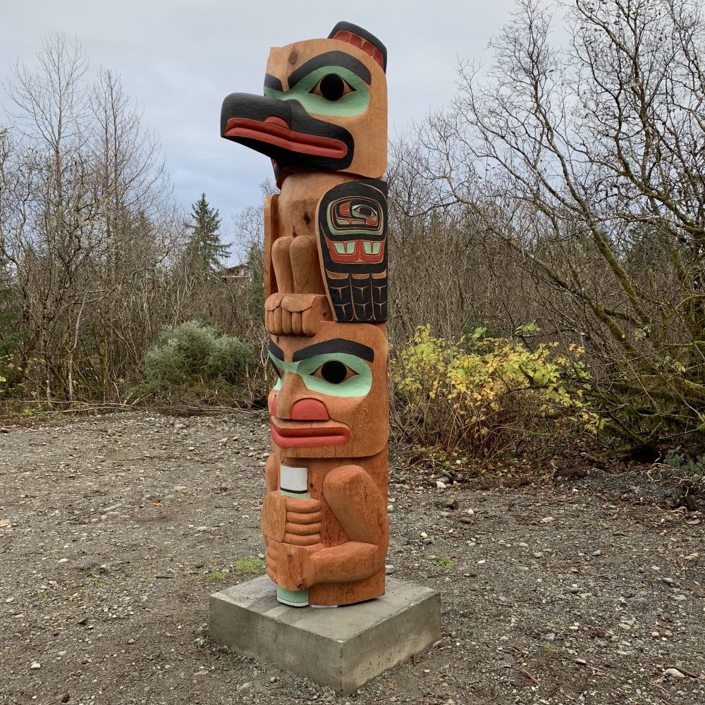 Alison Marks' first totem pole honors the memory of her grandfather, John Bremner Sr. of Yakutat, and depicts holding a thermos of coffee under a raven. (Photo courtesy of Allison Marks)