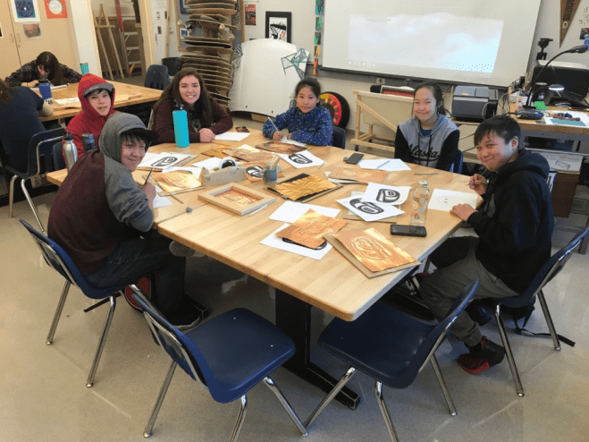 Napakiak students came to Sitka to learn about life and culture in the region. Above, they study northwest coastal arts. (Photo courtesy of Keri Gray)
