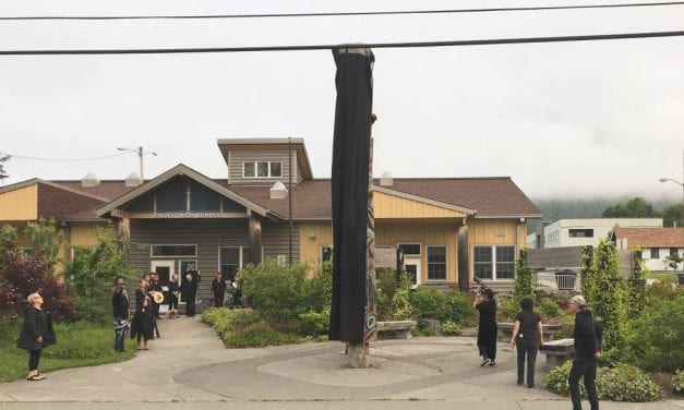 Sitkans mourn budget veto, drape totem pole in black