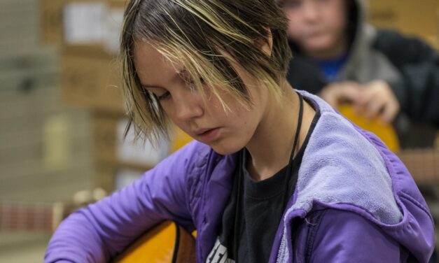 Strum and get it: fine arts campers score free guitars