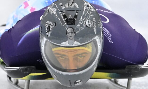 Ukrainian Olympian disqualified over images of war dead on his helmet