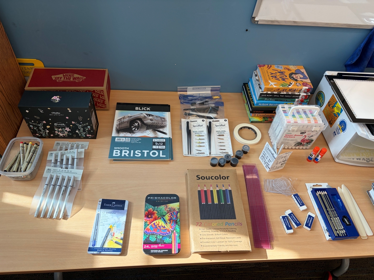 The donated art supplies and graphic novels de la Cruz donated to Pacific High (KCAW/Cotter)