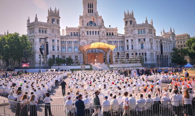 1 million people flood Madrid streets to see the pope’s flower-carpeted procession